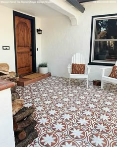 two white chairs sitting on top of a tiled floor next to a wooden door and window