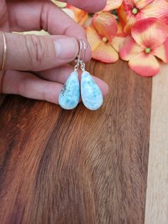 Teardrop shaped larimar gemstone earrings.   Gorgeous baby blue to Deep blue hues  Dangles approx 1.5 inches from earlobe. Available in sterling silver, gold filled, rose gold filled   Please know there is imperfections and inclusions in the stone but gorgeous nonetheless❤ Have any questions please ask! Hypoallergenic Adjustable Drop Jewelry, Nickel-free Larimar Silver Jewelry, Hypoallergenic Teardrop Fine Jewelry, Nickel Free Teardrop Fine Jewelry, Nickel-free Teardrop Fine Jewelry, Nickel-free Pear-shaped Earrings For Gifts, Elegant Handmade Larimar Jewelry, Oval Hypoallergenic Teardrop Earrings As Gift, Hypoallergenic Oval Teardrop Earrings For Gifts