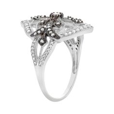 A decorative floral and cross motif adorned with black and white diamonds gives this ring distinctive style. Add a beautiful touch to your ensembles wearing this sterling silver ring. Comes in a gift box. Click on this JEWELRY & WATCHES GUIDE to learn about fit, styles, materials and more!RING DETAILS Width: .82 in. Metal: white rhodium-plated sterling silver, black rhodium-plated sterling silver DIAMOND DETAILS Total weight: 3/8 ct. Cut: round Color grade: H-I Clarity: I1-I2 Setting: prong Imag Luxury Silver Flower Ring With Single Cut Diamonds, Silver Flower Ring With Single Cut Diamonds, Elegant Rings With Black Diamonds In Diamond White, Elegant Silver Diamond Ring With Black Diamonds, Elegant Diamond White Rings With Black Diamonds, Luxury Silver Diamond Ring With Black Diamonds, Diamond White Ring With Black Diamonds, White Gold Diamond Ring With Black Diamonds, Fine Jewelry Diamond White Ring With Black Diamonds