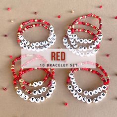 red and white beaded bracelets with name tags on the front, set of four