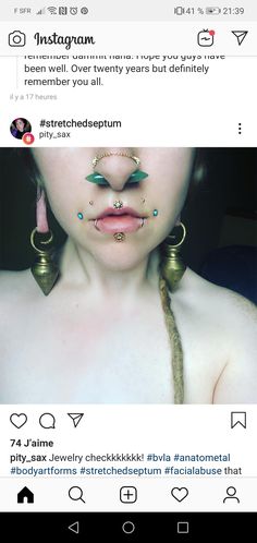 a woman with fake nose rings and piercings on her face