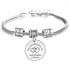 PRICES MAY VARY. 1.If you are looking for a special gift for your aunt, this stylishly designed engraved bracelet is the perfect choice. The meaningful lettering on this bracelet makes it a unique gift for aunt from nephew. The aunt nephew bracelet expresses the nephew's deep love or gratitude to the aunt. It is not just a small gift, but a big surprise for aunt from nephew! Suitable for any occasion, such as birthday, Thanksgiving, Christmas and other holidays The pendant on the bracelet is eng Father's Day Gift Engraved Bracelets, Personalized Charm Bracelet For Father's Day Gift, Personalized Novelty Charm Bracelet For Birthday, Novelty Personalized Charm Bracelet For Birthday, Customized Charm Bracelet For Friendship On Mother's Day, Nickel-free Charm Bracelet For Birthday And Mother's Day, Personalized Novelty Jewelry For Mother's Day, Mother's Day Charms Bangle Bracelets, Mother's Day Charm Bracelet Gift