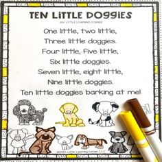 the ten little dogs worksheet is on top of a table with pens and markers