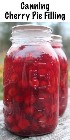 two mason jars filled with cherry pie filling