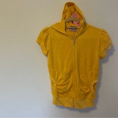 Perfect As A Swim Cover Up. Ruched Pockets And Ruched Shoulder Detail. Classic Juicy Terry Cloth Fabric, With Silver J Zipper And Hoodie. Brand New, Never Worn. I Also Have A Pink One. 2000s Juicy Couture, Juicy Couture Clothes, Shopping Wishlist, 2000s Clothes, Short Sleeve Jacket, Cloth Fabric, Yellow Shorts, Swim Cover, Fit Inspo