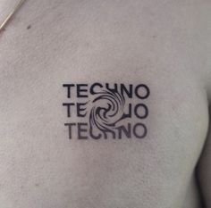 a man with a tattoo on his chest that says tecno tecno