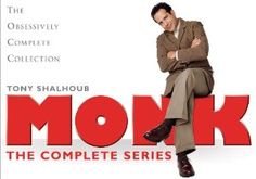 a man sitting on top of a chair in front of a sign that says monk the complete series