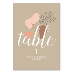 a table card with the words table on it and leaves in pink, brown and white