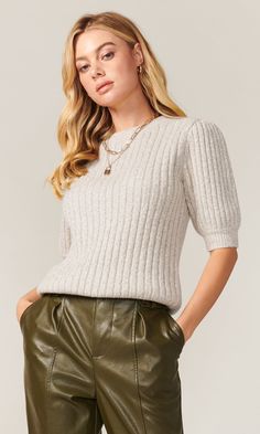 Soft and cozy, our Francis knit top is knitted from a marled rib knit in a neutral grey/taupe shade. It has a medium weight to the touch. Crew neckline with short sleeves, has ample stretch and it's meant to fit slim and easy. Length from shoulder to hem: 22 1/2" Across chest: 15 1/2" Sleeve length: 12 3/8“ imported 70% Acrylic / 16% Angora / 6% Nylon / 2% Spandex Style #: G106W5617 Knit Short Sleeve Top, Short Sleeve Knit Top, Knit Short, Knit Tops, Sweaters Knitwear, Knit Shorts, Fall Looks, Ribbed Sweater, Sweater Weather