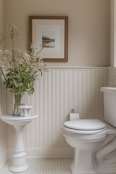 25 Genius Tiny Bathroom Ideas For Your Makeover Small Bathroom Ideas White Vanity, Banjo Bathroom Countertop, Board And Batten Bathroom Paint Colors, Bead Board Ceiling Bathroom, Small Toilet Room Ideas Farmhouse, Painted Small Bathroom, Bathroom With White Wainscoting, Entryway Bathroom Ideas, Half Bath With Wainscoting