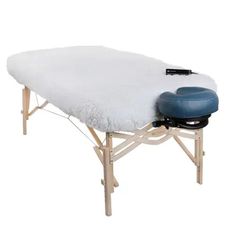 Earthlite's DLX Digital Warmer boasts a soft fleece cover and advanced digital warming pad that allows for customizable heat up to 135°F and timer settings for up to 10 hours. With overheat protection and automatic shutoff, you can feel safe and secure. Features TWO-IN-ONE MASSAGE TABLE WARMER & FLEECE PAD - Your clients will stay warm and cozy this premium 1” (2.5cm) thick fleeced heating pad in the coldest of environments. PROPRIETARY DIGITAL TOUCH SCREEN HAND CONTROL – Makes programming easy. Massage Equipment, Massage Tables, Professional Massage, Massage Table, Towel Warmer, Table Pads, Heating Pad, Self Service, Injury Prevention