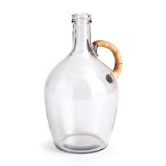 a glass bottle with a wooden handle on a white background in the shape of a carafe