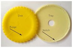 two pieces of yellow plastic with the words dek, tray and notch on them