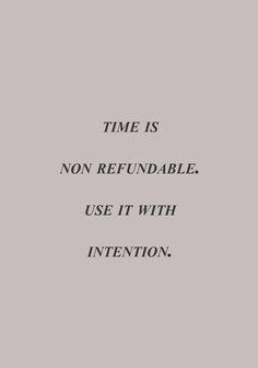 the words time is non refundable use it with intention, on a gray background