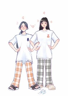 two people standing next to each other wearing pajamas