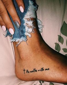 a woman's foot with a tattoo that says, thanks to the one