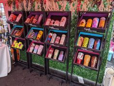 the display case is filled with different types of candy and candies for sale at the store