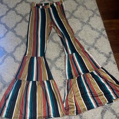 New Never Worn Wait For The Bell Flare Pant Size L Firm Multicolor Vertical Stripes Bottoms For Spring, Striped High Waist Bottoms For Fall, High Waist Striped Bottoms For Fall, Fall Striped High Waist Bottoms, Spring Multicolor Vertical Stripes Bottoms, Spring Multicolor Striped Bottoms, Funky Flare Pants, Stretch Flare Striped Pants, Bell Bottom Jeans Striped