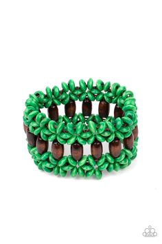 Green wooden discs and brown wooden beads are threaded along braided stretchy bands around the wrist, creating a colorful tropical display. Orange Order, Bali Beach, Happy Jewelry, Bali Beaches, Green Box, Beach Retreat, Wooden Bracelet, Wood Bracelet, Green Jewelry