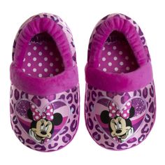 a pair of minnie mouse slippers with polka dots