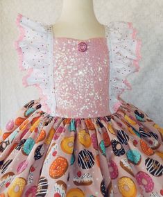 This is a beautiful Donut dress for your little one will look gorgeous in this dress, is perfect for a birthday donuts party. Girls size Chest 2T 19'' 3T 21'' 4T 22'' 5T 23'' 6 24'' I use an underskirt just to show how puffy is the dress. if you want a puffy look you will need to buy a under skirt and it sold separately. Any question please don't hesitate in contact me. Please leave me a note with the following instructions. *Size Cute Pink Twirl Dress For Party, Fitted Sweet Princess Dress For Birthday, Sweet Fitted Princess Dress For Birthday, Cute Party Twirl Dress With Fitted Bodice, Cute Twirl Dress With Fitted Bodice For Party, Cute Fitted Twirl Dress For Party, Toddler Donut Costume, Donut Inspired Outfit, Cute Pink Dress For Cake Smash