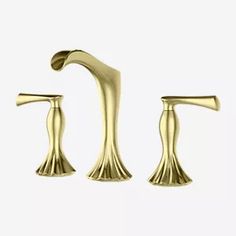 two gold faucets on a white background