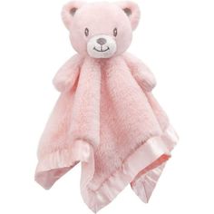 a pink teddy bear is wrapped in a blanket