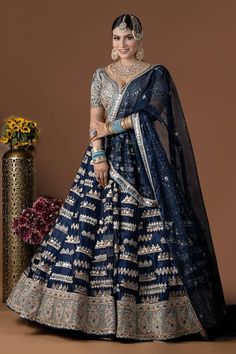 Blue flared organza lehenga with Bahara garden embroidery using gota and mirror highlights. Paired with a heavily mirror, gota embroidered flattering leaf neck blouse and a floral embroidered cutwork border tissue organza dupatta. - Aza Fashions Blue Organza Anarkali Set With Intricate Embroidery, Blue Organza Choli With Zari Work, Festive Blue Organza Lehenga, Blue Unstitched Organza Choli, Blue Anarkali Embroidered Organza Fabric, Blue Bollywood Choli In Organza, Designer Blue Organza Lehenga, Blue Organza Dupatta For Navratri, Blue Organza Lehenga With Intricate Embroidery