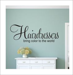 a wall decal that says hairdressers bring color to the world