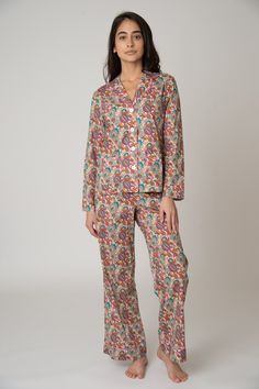 The Colony PJ Set is for comfort and fashion. The stylish wide-leg pant is complemented with the pull-on-and-go elastic waist. Make a statement with the whole look or break it up to make it your own. Style the shirt for day with jeans. Made with Liberty London Fabric. 100% cotton lawn Cold water wash / Hang dry Made in USA Model is 175cm/ 5'9" and is wearing a Small Colony Top Long sleeve 2 patch pockets 4 button front closure Colony Pant Wide-leg Side-seam pockets Elastic waist with drawstring The Colony, Liberty London, Cotton Pajama Sets, Brooklyn Nets, Liberty Fabric, Cotton Pyjamas, Pj Sets, Lingerie Sleepwear, Leg Pants