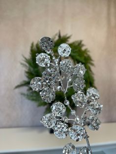 a crystal vase with some flowers in it