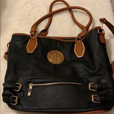 Michael Kors Leather Purse. Looks Brand New. Soft Leather. Comes With Cross Body Strap. Michael Kors Black Shoulder Bag With Zipper Closure, Michael Kors Black Shoulder Bag With Zipper, Summer Purses, Monogram Tote Bags, Brown Purse, Carryall Tote, Bags Michael Kors, Blue Tote, Monogram Tote