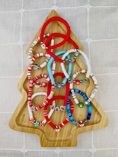 Christmas Themed Clay Beaded Stretchy Bracelets Size: 7 inches Perfect bracelets for the entire holiday season and winter. Choose between classic Christmas colors or neutral tones. *All bracelets are strung at random and won't be in the exact same pattern as pictured* Clay Beaded Bracelets, Winter Bracelet, Friendship Bracelets With Beads, Clay Bracelet, Great Gifts For Women, Winter Themed