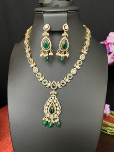 Victorian Moissanite  Necklace AD Green beads drop /Victorian Necklace with Earrings /Light weight/Mehendi finish/Indian Jewelry This item is perfect for parties Gift and festivals! DETAILS: Includes One Mid Size Necklace Two Earrings  Necklace: 24.0 inches. Adjustable length. Chain closure. Weighs 1.70oz (49 g).  Earrings: 1.3 inch(es) long. Earring set weighs 0.45 oz (12 g). Earring backs push on/off. Material: Imitation Brass Antique gold Finish CZ Stones. Finish: Premium Quality Antique gold finished  NOTE: I try my best to show you photos of my products as they appear in real life, but please note that variations in color occur due to differences in lighting and screen settings.  PRODUCT CARE: - Avoid contact with heat/fire, water, and chemicals such as perfumes or any sprays to preve Elegant Green Kundan Necklace With Latkans, Intricate Design Drop Jewelry For Wedding, Elegant Green Bridal Necklace With Latkans, Green Teardrop Bridal Necklace For Wedding, Traditional Green Teardrop Necklace, Traditional Green Jewelry Sets With Elegant Design, Green Teardrop Necklace With Matching Earrings, Victorian Necklace, Long Earring