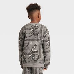 Your young warrior will be ready for cooler weather in this Marvel Black Panther Crewneck Fleece Sweatshirt. Made from a soft fleece fabric for cozy comfort, this crewneck sweatshirt is designed with banded cuffs and a banded hem for a snug fit, while flat seams offer them extra comfort. Adorned with allover print of the Black Panther face mask and Shuri with classic Wakandan art, they'll love coordinating it with a variety of their bottoms for versatile outfit options. Casual Fleece Sweatshirt With Character Print, Sporty Winter Sweatshirt With Character Print, Sporty Long Sleeve Sweatshirt With Character Print, Character Print Cotton Sweatshirt For Loungewear, Cotton Character Print Sweatshirt For Loungewear, Cotton Sweatshirt With Character Print For Loungewear, Casual Character Print Sweatshirt For Loungewear, Fall Fleece Sweatshirt With Character Print, Winter Character Print Fleece Tops