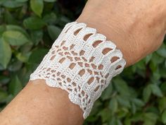 Crochet Cuff Pattern, Wrist Wrap Pattern, Crochet Bracelet, Wedding Cuff, Wrist Warmer, Button Cuff, Bridesmaid Bracelet, Cotton Crochet This pattern is for one of the crochet cuff bracelet patterns designed by me. This is a great accessory to any time. These DIY accessories make perfect gifts for you, your friends and your family.You can make this cuff bracelet by using any type of lace thread. you can adjust the size to your own wrist. The size of the bracelet depend on the thickness of the lace thread you are working with. Also, you can make bookmark or headband or choker necklace, scarf with this design. Skill level: intermediate size:  width : 6cm          length: 18cm THIS IS A DIGITAL DOWNLOADABLE FILE (PDF PATTERN TUTORIAL) - NOT A PRODUCT. ----------------------------------------- Handmade Cuff Bracelet For Wedding, Handmade Wedding Cuff Bracelet, Handmade Cuff Bracelets For Weddings, Elegant Adjustable Crochet Jewelry, Adjustable Cuff Bracelet For Wedding, Elegant Handmade Cuff Bracelet For Wedding, Elegant Handmade Wedding Cuff Bracelet, Handmade White Cuff Bracelet, Handmade White Cuff Bracelet For Weddings