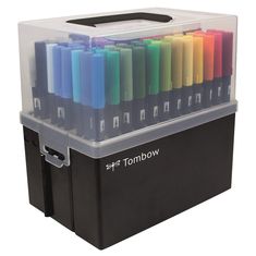 a plastic box filled with different colored crayons on top of each other and the words tomorrow written in white