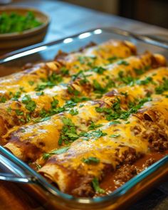 a casserole dish with meat, cheese and parsley