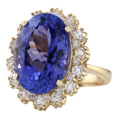 Stamped: 14K Yellow Gold Total Ring Weight: 7.3 Grams Ring Length: N/ARing Width: N/A Gemstone Weight: Total Natural Tanzanite Weight is 11.28 Carat (Measures: 16.20x11.55 mm) Color: Blue Diamond Weight: Total Natural Diamond Weight is 1.10 Carat Quantity: 28 Color: F-G, Clarity: VS2-SI1 Face Measures: 21.20x17.00 mm Sku: [703506W] Luxury Yellow Gold Gia Certified Gemstones, Luxury Tanzanite Rings For Formal Occasions, Luxury Gia Certified Yellow Gold Gemstones, Luxury Formal Tanzanite Ring, Luxury Tanzanite Diamond Ring For Formal Occasions, Classic Tanzanite Ring For Formal Occasions, Formal Tanzanite Fine Jewelry Rings, Luxury Tanzanite Yellow Gold Ring, Luxury Tanzanite Gemstones For Formal Occasions