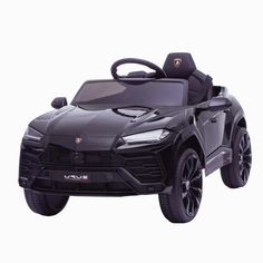 a black toy car is shown on a white background with the hood up and wheels down