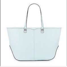 Gorgeous Leather Tote In Light Mint. Very Roomy, The Inside Features One Large Middle Compartment With A Zipper That You Can Put Laptop On It. 2 Multifunction Pockets And 1 Zip Interior Pocket. The Exterior Has A Double Strap With A 8 " Drop. It's 19 " Across The Top And 11.5 In Height. The Bottom Is 6.5 " Across. Silvertone Pyramid Studs Accent The Handle Base. (It Has Tiny Blemish Show In The 4th Photo But Unnoticeable) Nwt Chic Light Blue Shoulder Bag For Shopping, Chic Light Blue Bags For Errands, Chic Light Blue Bag For Errands, Modern Light Blue Shoulder Bag For Shopping, Chic Light Blue Bags For Shopping, Chic Light Blue Tote Bag, Chic Light Blue Shopping Bag, Modern Light Blue Tote Bag, Rebecca Minkoff Julian Backpack