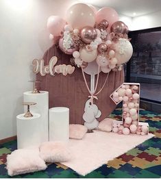 a room with balloons and decorations on the floor