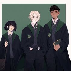 three young men dressed in harry potter outfits, one holding a book and the other standing next to him