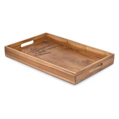 a wooden tray with handles and writing on the bottom, sitting on a white surface