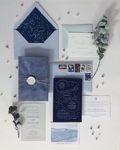 the wedding stationery is laid out neatly and ready to be used as an envelope