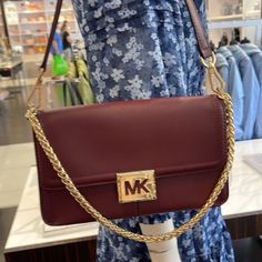 Michael Kors Sonia Medium Leather Shoulder Bag Merlot Color: Merlot Shoulder Bag Leather 100% Leather Gold-Tone Hardware 10.25”W X 5.75”H X 2.75”D Exterior Details: Back Slip Pocket Interior Details: Back Zip Pocket Lining: 100% Polyester Snap Fastening Smoke And Pet Free. Merlot Color, Michael Kors Bedford, Mk Purse, Studded Bag, Exterior Details, Michael Kors Shoulder Bag, Mk Bags, Purses Michael Kors, Handbags Michael Kors