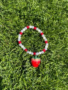 This beautiful bracelet the most lovely gift for strawberry lovers! The bracelet is featured on elastic and crimped. One size fits most. Please contact me for any sizing inquiries so that I can best accommodate you. Fruit Bracelet Strawberry Clay Beads, Cute Red Stretch Bracelet As Gift, Cute Red Stretch Bracelet Gift, Strawberry Bracelet, Pulseras Aesthetic, Pearl Crafts, Diy Rings, Bracelet Diy, Diy Bracelets