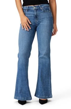 Dramatically flared legs add undeniable '70s boogie to high-rise, full-length jeans cut from vintage-inspired stretch denim in a fading-blue wash. 34 1/2" inseam; 24 1/2" leg opening; 10" front rise Zip fly with button closure Five-pocket style 91% cotton, 7% polyester, 2% spandex Machine wash, line dry Imported High-rise Medium Wash Flares With Five Pockets, Fall Medium Wash Wide Leg Flares, High Rise Blue Flares For Fall, Retro High Rise Medium Wash Flares, Retro High-rise Medium Wash Flares, High Rise Denim Blue Flares, Retro Medium Wash Wide Leg Flares, Retro Mid-rise Medium Wash Flares, Retro Medium Wash Straight Leg Flares