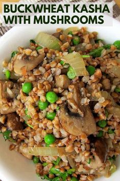 a white plate topped with mushroom and peas