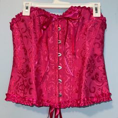 Hot Pink Corset With Front Closures And Ribbon Tie Up In The Back. Tag Says L But Fits Like S-M. Never Been Worn. Perfect For A Halloween Costume. Hot Pink Corset, A Halloween Costume, Pink Corset, Ribbon Tie, Women Corset, Halloween Costume, The Back, Pink Ladies, Hot Pink